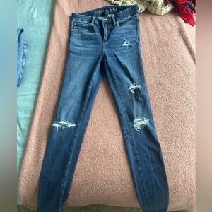 Distressed High Rise Jegging
